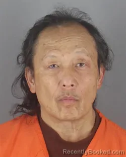 Mugshot of GEI XIONG booked in Hennepin County, Minnesota on April 27, 2026