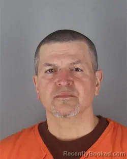 Mugshot of MICHAEL LEE RASMUSSEN booked in Hennepin County, Minnesota on April 27, 2026