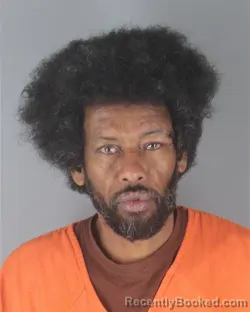 Mugshot of ASKAR GEEDI MOHAMMED booked in Hennepin County, Minnesota on April 28, 2026