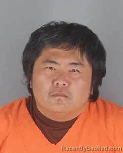 Mugshot of TOU LU YANG booked in Hennepin County, Minnesota on April 28, 2026