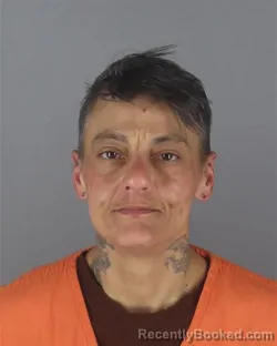 Mugshot of EMMA KUUIPOLEI WOOD booked in Hennepin County, Minnesota on April 29, 2026