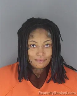 Mugshot of TONESHA MICHELLE HAMILTON booked in Hennepin County, Minnesota on April 30, 2026