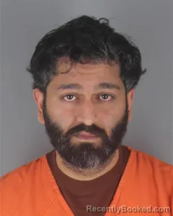 Mugshot of RAJI FAILSAL RAMMOUNI booked in Hennepin County, Minnesota on May 1, 2026