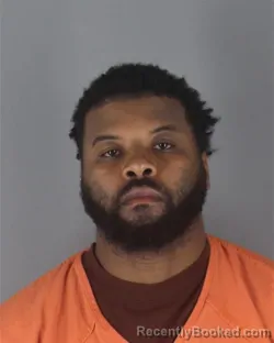 Mugshot of JONTE TRE VONN WARREN booked in Hennepin County, Minnesota on May 1, 2026