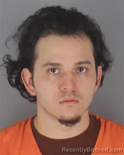 Mugshot of JAIRO STANLEY ALVAREZ HUEZO booked in Hennepin County, Minnesota on May 3, 2026