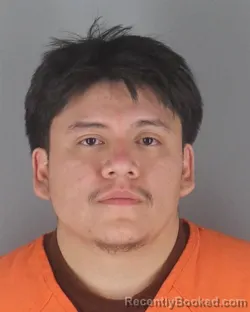 Mugshot of JERRY FERNANDO GUANUCHI QUEZADA booked in Hennepin County, Minnesota on May 4, 2026