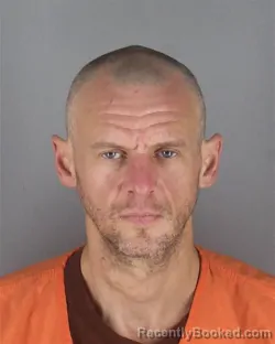 Mugshot of SHAWN MICHAEL OLSON booked in Hennepin County, Minnesota on May 4, 2026