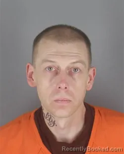 Mugshot of CHRISTOPHER RICHARD TIBBETTS booked in Hennepin County, Minnesota on May 5, 2026