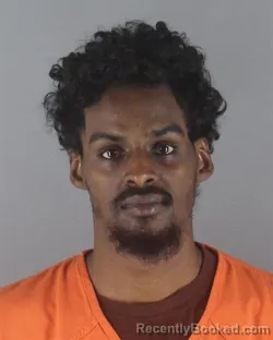 Mugshot of ABDIRAHMAN YUSUF HASSAN booked in Hennepin County, Minnesota on May 5, 2026