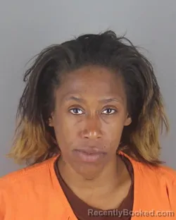 Mugshot of ASHLEY ESTHER PATTERSON booked in Hennepin County, Minnesota on May 5, 2026