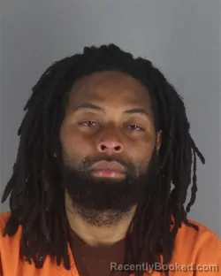 Mugshot of MICHAEL JAMAL WARNER booked in Hennepin County, Minnesota on May 6, 2026