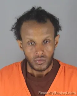 Mugshot of ABDISHAKUR HASSAN MOALLIN booked in Hennepin County, Minnesota on May 6, 2026