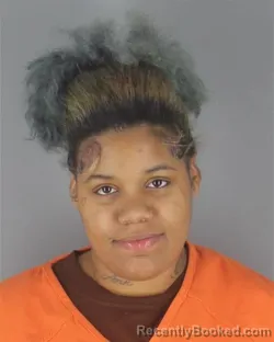 Mugshot of LAILA DARSHAN WHITTAKER booked in Hennepin County, Minnesota on May 7, 2026