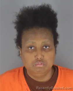 Mugshot of MARLENA RENEE DAVIS booked in Hennepin County, Minnesota on May 7, 2026