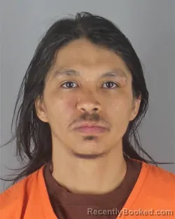Mugshot of SANTOS RICHARD FLORES booked in Hennepin County, Minnesota on May 7, 2026