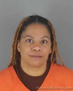 Mugshot of ASHLEY MONIQUE ALLEN booked in Hennepin County, Minnesota on May 7, 2026