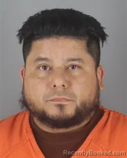 Mugshot of JONATHAN ANTONIO REYNOSA booked in Hennepin County, Minnesota on May 7, 2026