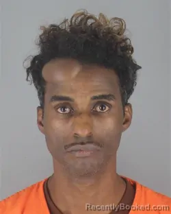 Mugshot of GULED MAHAMUD ABDULLAHI booked in Hennepin County, Minnesota on May 7, 2026