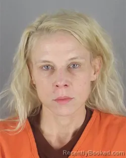 Mugshot of KRISTIN MICHELLE DENNISON booked in Hennepin County, Minnesota on May 7, 2026