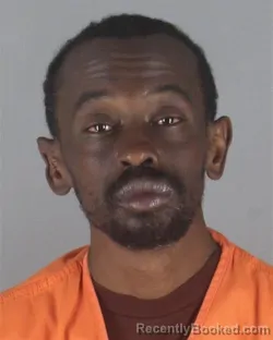 Mugshot of ABDULAHI AHMED OMAR booked in Hennepin County, Minnesota on May 7, 2026