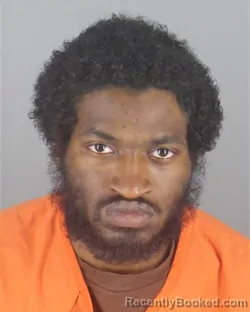 Mugshot of TRISTIAN JACQUES CARLOS COFFEY booked in Hennepin County, Minnesota on May 7, 2026