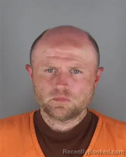 Mugshot of JARRETT SEAMANS booked in Hennepin County, Minnesota on May 7, 2026