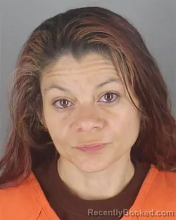 Mugshot of CHERRY STEPHANIE MARRA booked in Hennepin County, Minnesota on May 7, 2026