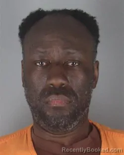 Mugshot of JEAN PIERRE HAKIZIMANA booked in Hennepin County, Minnesota on May 8, 2026