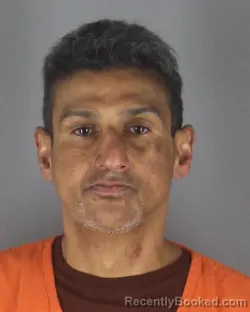 Mugshot of JOSE HECTOR CABAN-REYES booked in Hennepin County, Minnesota on May 8, 2026