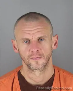 Mugshot of SHAWN MICHAEL OLSON booked in Hennepin County, Minnesota on May 8, 2026