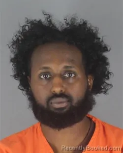 Mugshot of HAMSA MAHAMED RASHID HASSAN booked in Hennepin County, Minnesota on May 8, 2026