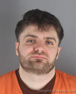 Mugshot of ETHAN RYAN JOSEPH MILLER booked in Hennepin County, Minnesota on May 8, 2026