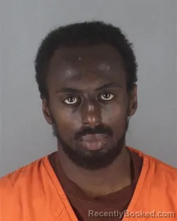 Mugshot of KHALID MOHAMED RASHID HASSAN booked in Hennepin County, Minnesota on May 9, 2026