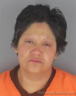 Mugshot of REINA CAROLINA RUBIO booked in Hennepin County, Minnesota on May 9, 2026