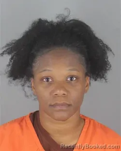 Mugshot of TINESHA LADORA TEKESTE booked in Hennepin County, Minnesota on May 9, 2026