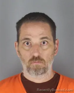 Mugshot of CHRISTOPHER MICHAEL GARDNER booked in Hennepin County, Minnesota on May 10, 2026
