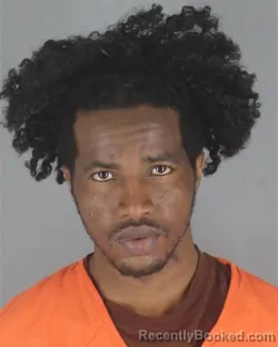 Mugshot of ABDIRISAK MUKTAR OMAR booked in Hennepin County, Minnesota on May 10, 2026