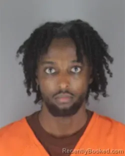Mugshot of AHMED ABDI IBRAHIM booked in Hennepin County, Minnesota on May 11, 2026