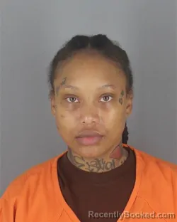 Mugshot of ALEXIS SHARDE CHANTRICE PIERCE booked in Hennepin County, Minnesota on May 11, 2026