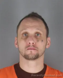 Mugshot of AARON BENJAMIN PATTERSON booked in Hennepin County, Minnesota on May 11, 2026