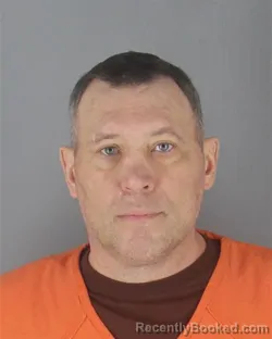 Mugshot of AARON DUANE TRAYNOR booked in Hennepin County, Minnesota on May 11, 2026
