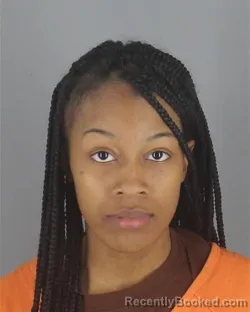 Mugshot of TIANA LASHAY ALIZE HUGHES booked in Hennepin County, Minnesota on May 11, 2026