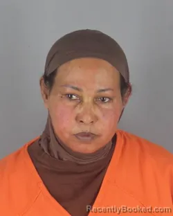 Mugshot of ASHA ARAB SUGULE booked in Hennepin County, Minnesota on May 11, 2026
