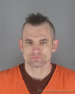 Mugshot of JACOB MITCHELL LEHMANN booked in Hennepin County, Minnesota on May 12, 2026