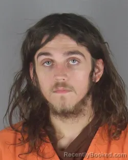 Mugshot of TALAN AUSTIN SCHULTZ booked in Hennepin County, Minnesota on May 12, 2026