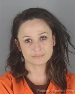 Mugshot of CHELSEA DOLLIE SMITH booked in Hennepin County, Minnesota on May 13, 2026