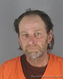 Mugshot of RONALD LYLE ADLER booked in Hennepin County, Minnesota on May 13, 2026