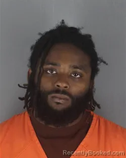 Mugshot of DAVION JERMAINE MCKINLEY booked in Hennepin County, Minnesota on May 13, 2026