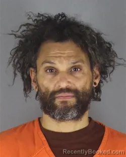 Mugshot of ANGELO RICARDO SOLOMON booked in Hennepin County, Minnesota on May 13, 2026