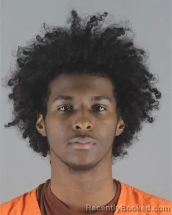 Mugshot of ABDIFITAH HASSAN OMAR booked in Hennepin County, Minnesota on May 13, 2026